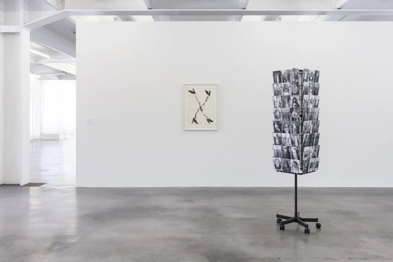Installation view, on the left: Georg Baselitz, "Ohne Titel", 2016, aquatint etching on offset paper, 76 x 55,5 cm, edition 9/25, on the right: Mathilde ter Heijne, "Woman* to Go", 2005-ongoing, installation with free postcards, offset print, variable, photo © Frank Kleinbach